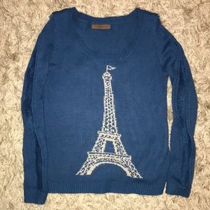 The Classic Eiffel Tower sweater in blue and white.